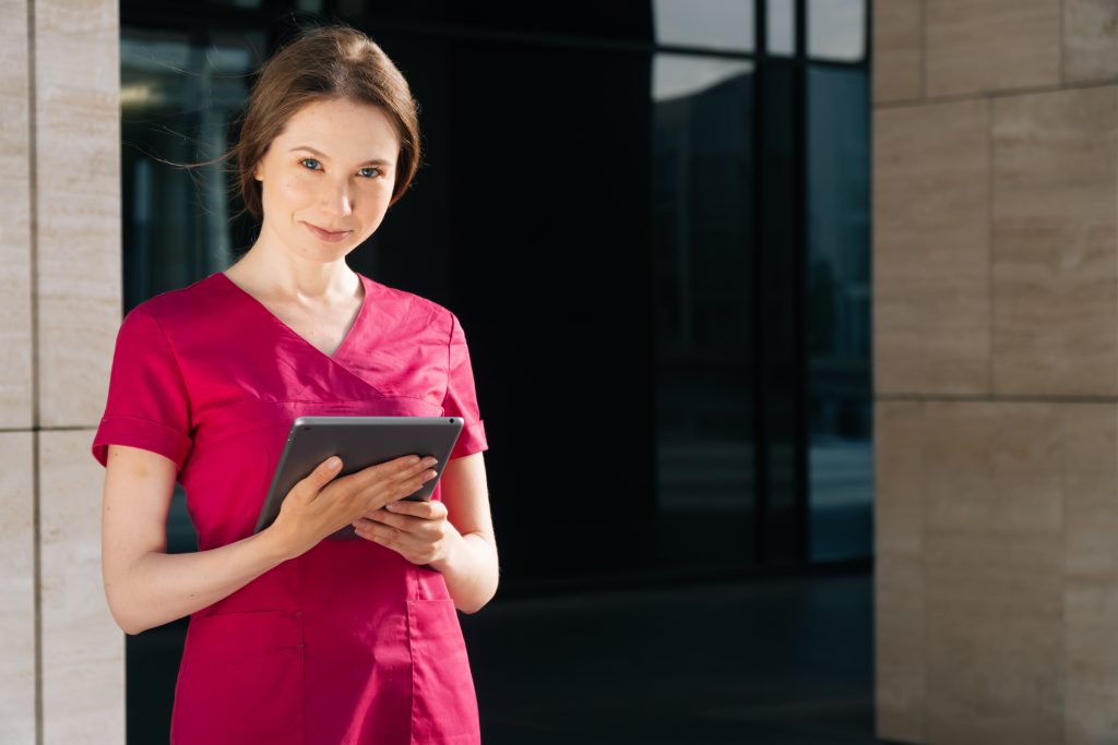 A doctor woman with a digital tablet.